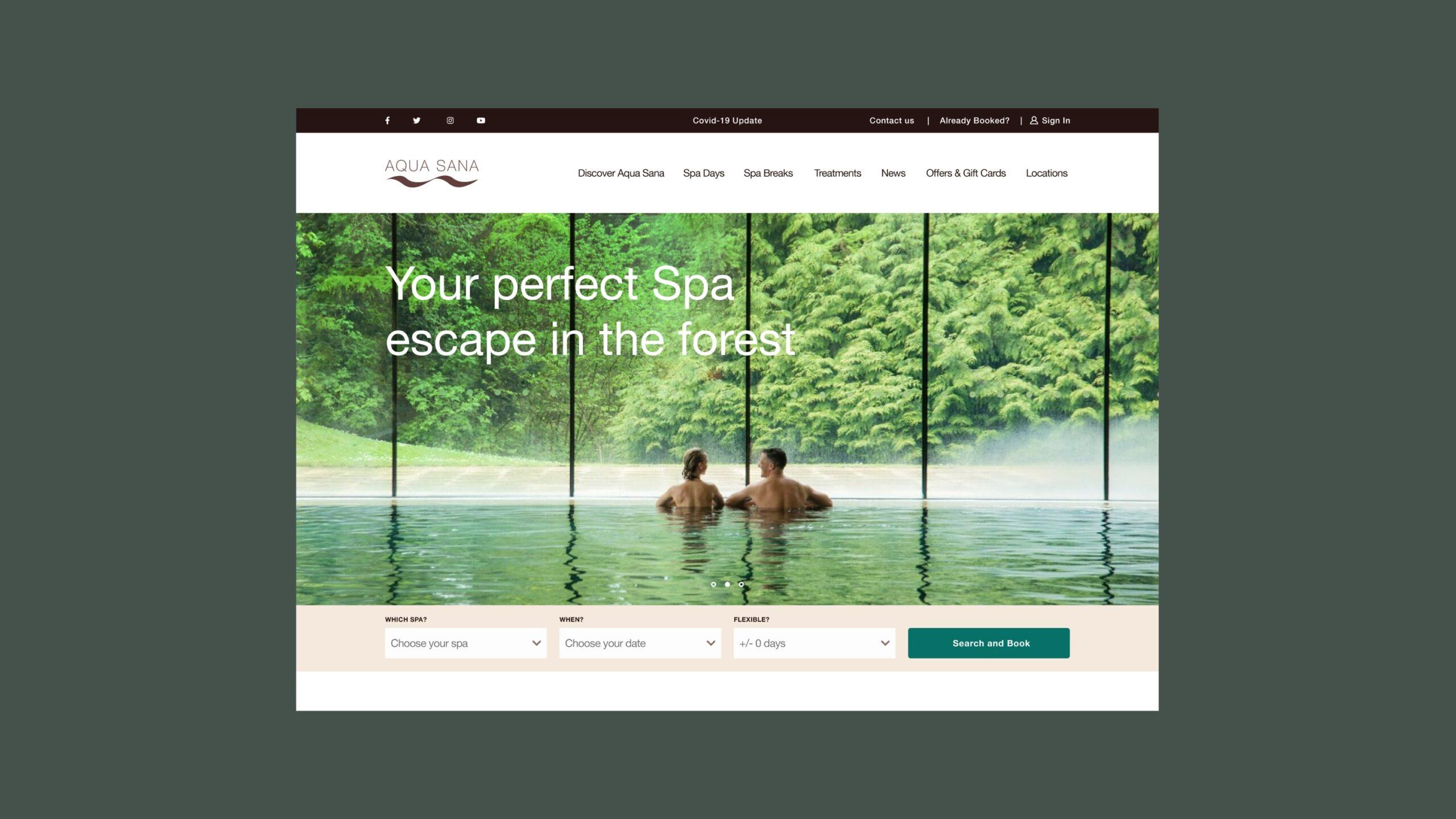 Two people relax in an indoor pool, facing large windows that reveal a lush green forest. Text on the image reads, “Your perfect Spa escape in the forest.” The scene conveys tranquility and nature.