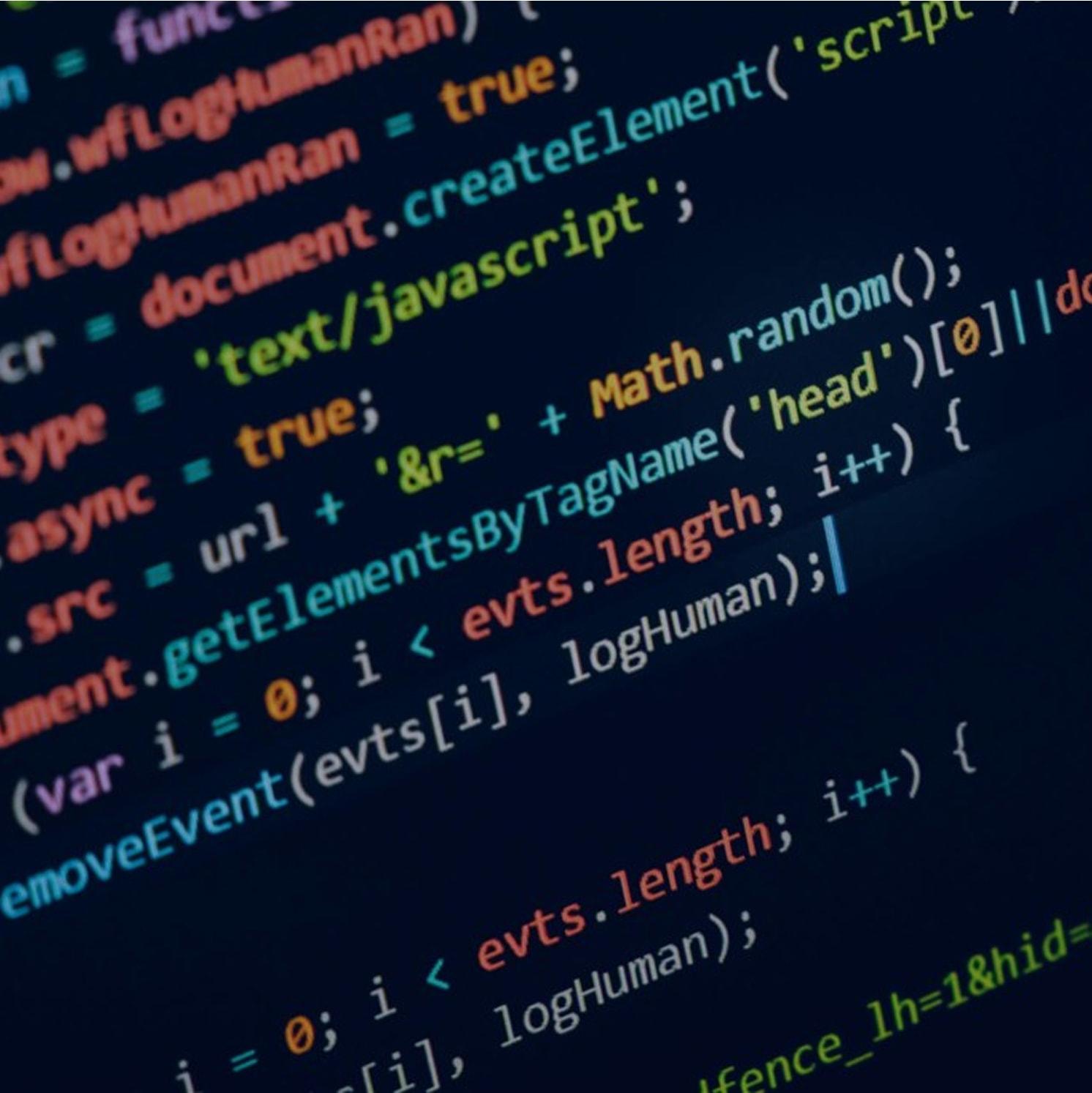 Close-up of a computer screen displaying colorful lines of JavaScript code on a dark background, highlighting syntax such as variables, functions, and conditional statements.